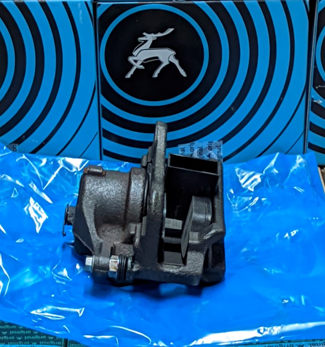 Суппорт тормозной ГАЗель, Соболь ЛЕВЫЙ с колодками Оригинал (00008391) 00001674А